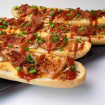 Pomysł na zapiekanki z boczkiem i pieczarkami